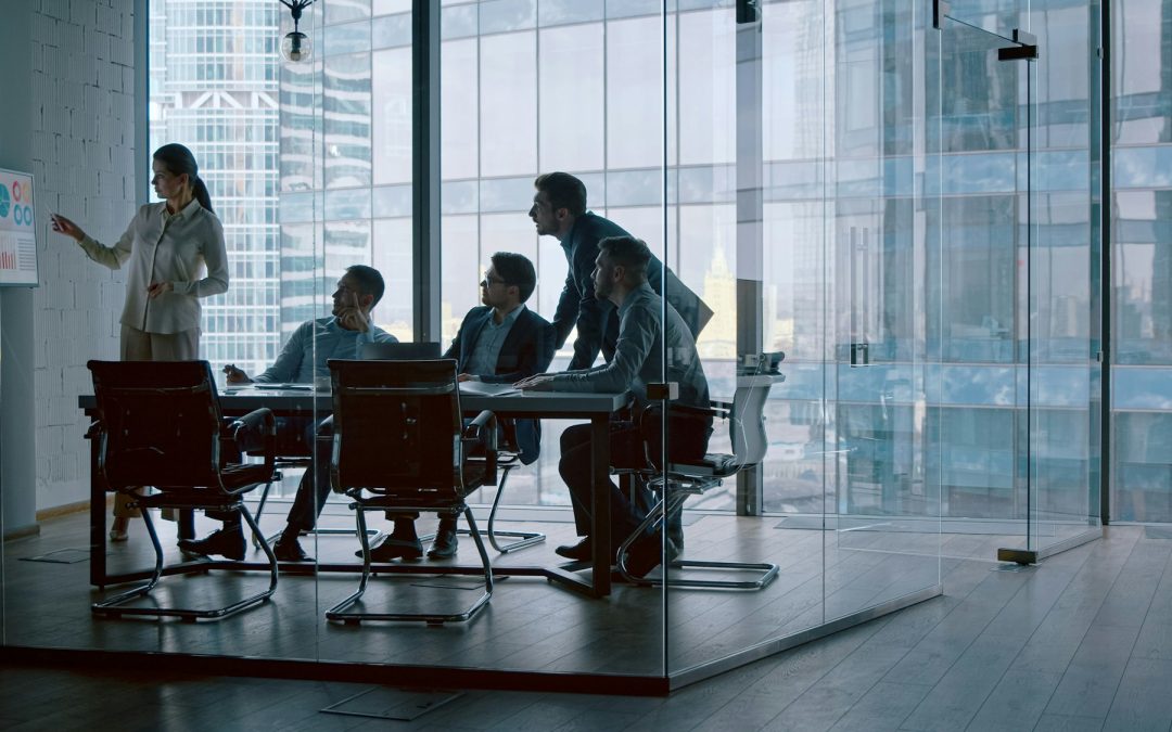 Mature financial analyst telling company development strategy