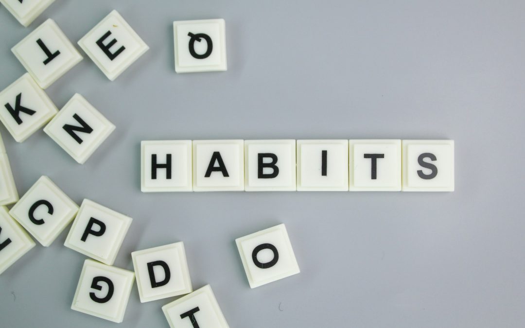 A mixture of letters of the alphabet with the word habits.
